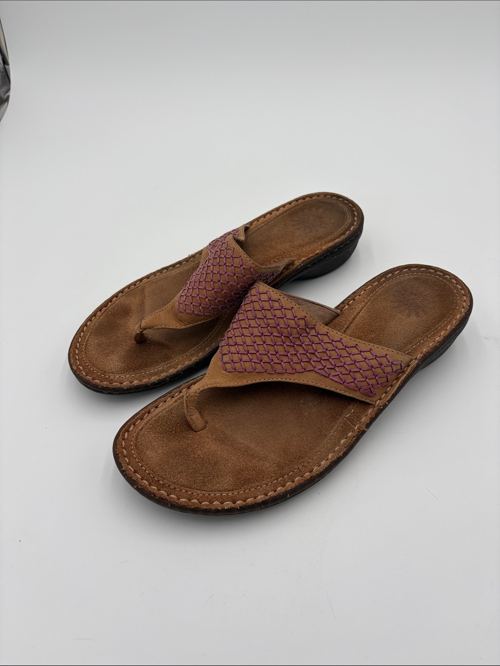 UGG women’s Mahala Brown Suede Thong Sandals with Purple Braided Strap